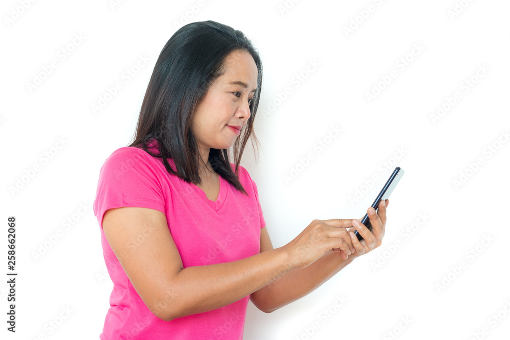 Asian woman in t-shirt with smartphone over white background. Asian woman in t-shirt with smartphone over white background.