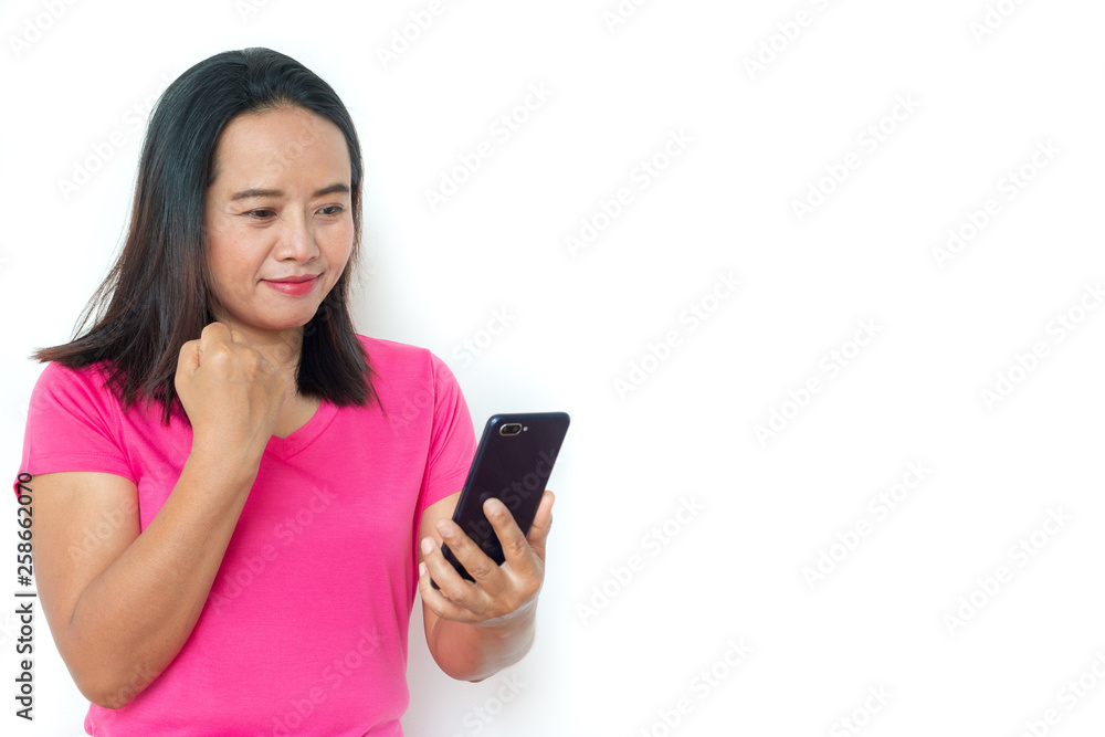 Asian woman in t-shirt with smartphone over white background. Asian woman in t-shirt with smartphone over white background.