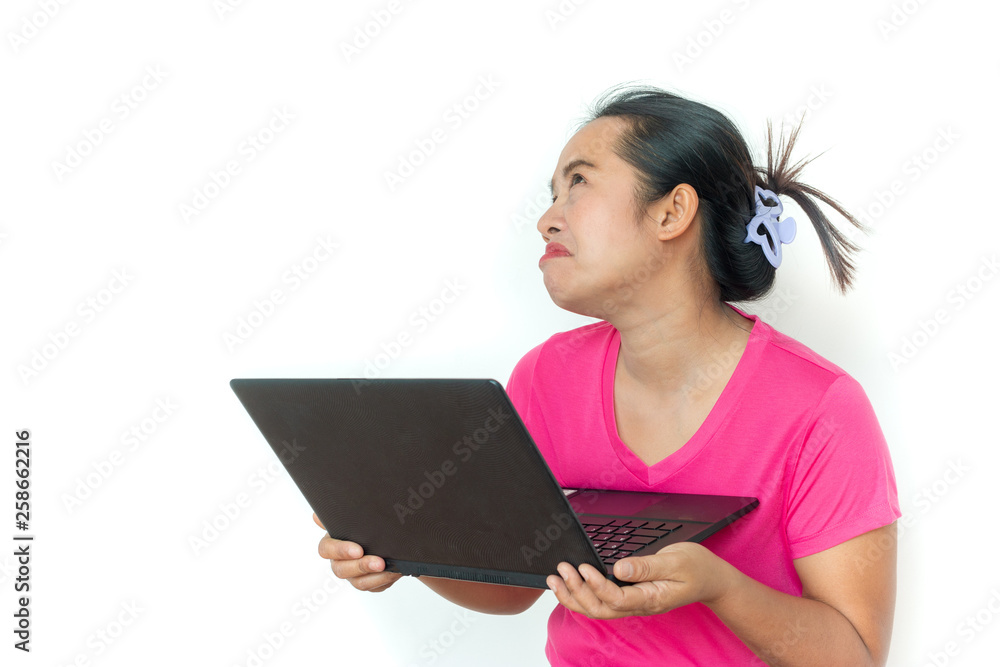 woman using laptop on white background ,Unhappy and angry mood. woman using laptop on white background ,Unhappy and angry mood.