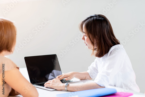 Happy business woman working in a office