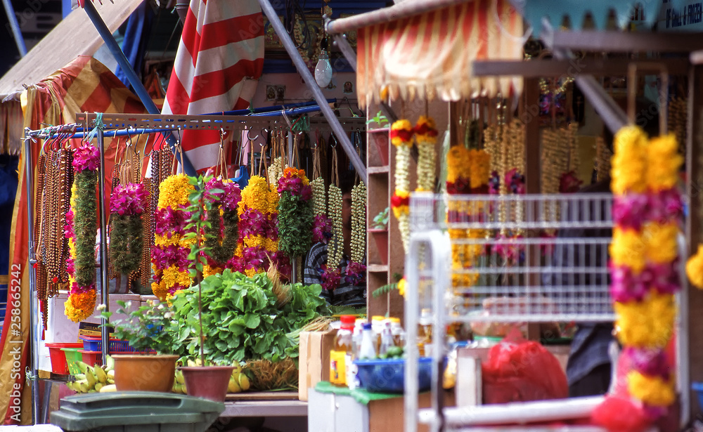 Flower garlands for sale at outdoor market