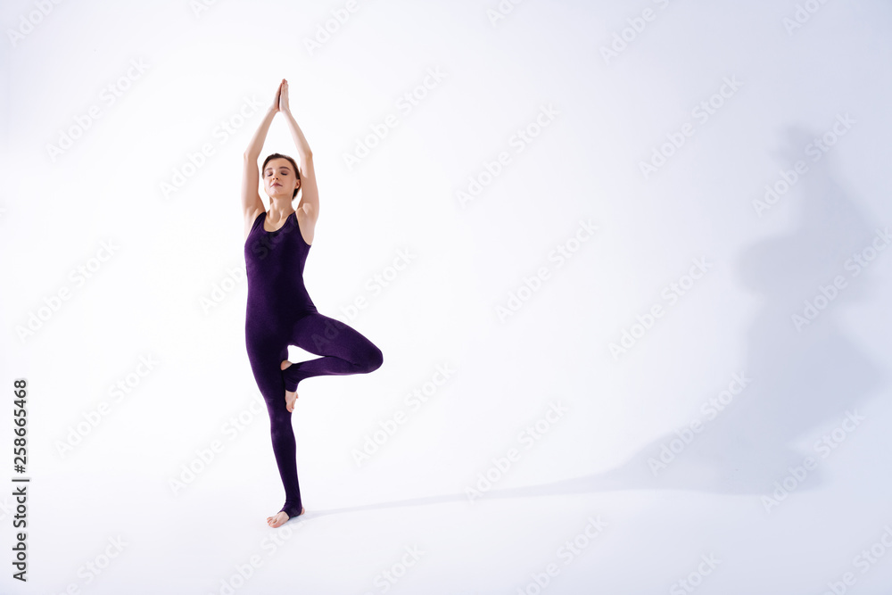 Beautiful young woman holding her hands up Beautiful young woman holding her hands up