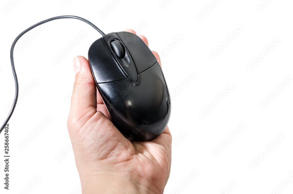 black computer mouse in female hand isolated on white background black computer mouse in female hand isolated on white background