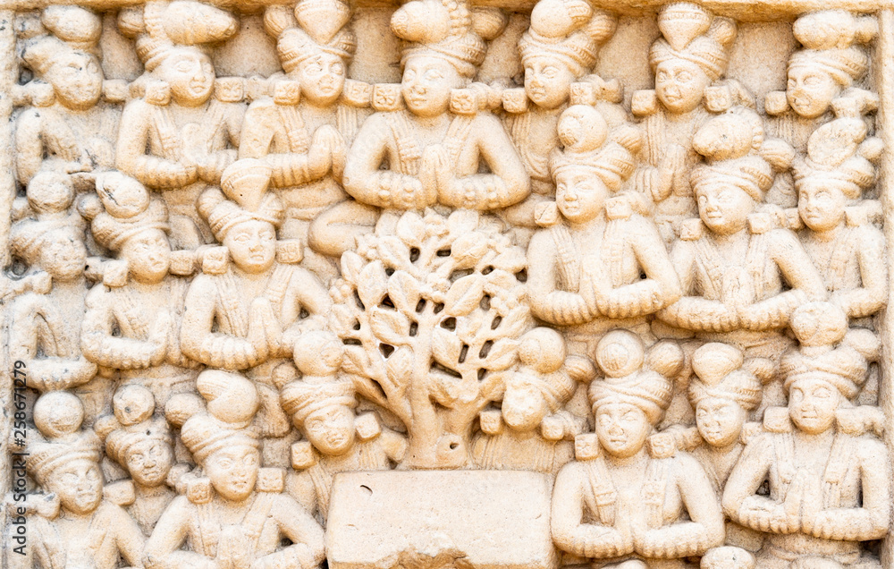 ancient stone sculptures carved into the wall of the temple ancient stone sculptures carved into the wall of the temple