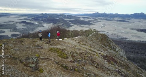 Women hiking along mountain ridge in Chile Patagonia aerial 4k