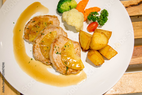 Fototapeta Naklejka Na Ścianę i Meble -   delicious pork steak on white plate