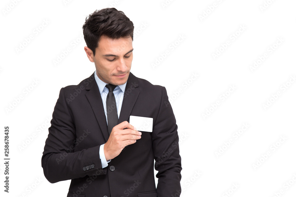 Handsome businessman in suit with business card isolated over white background Handsome businessman in suit with business card isolated over white background