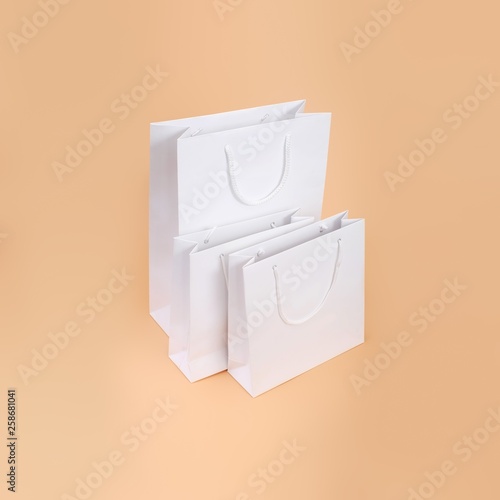 White paper bags isolated on simple background