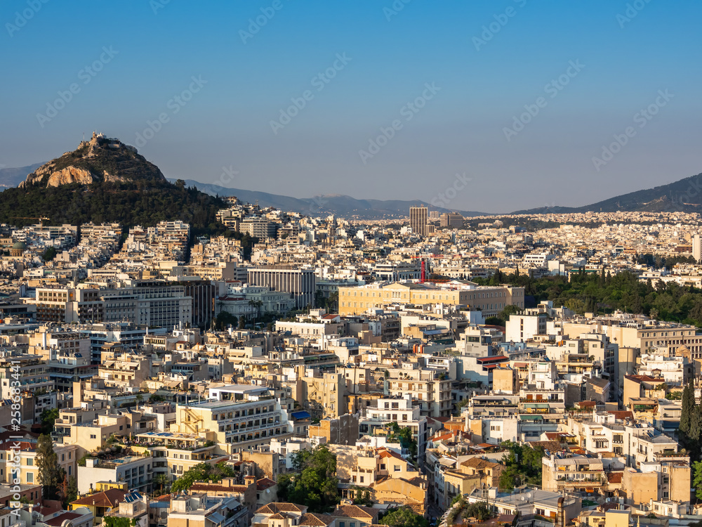View of Athens, Greece and mount of Lycabettus from Acropolis at sunset View of Athens, Greece and mount of Lycabettus from Acropolis at sunset
