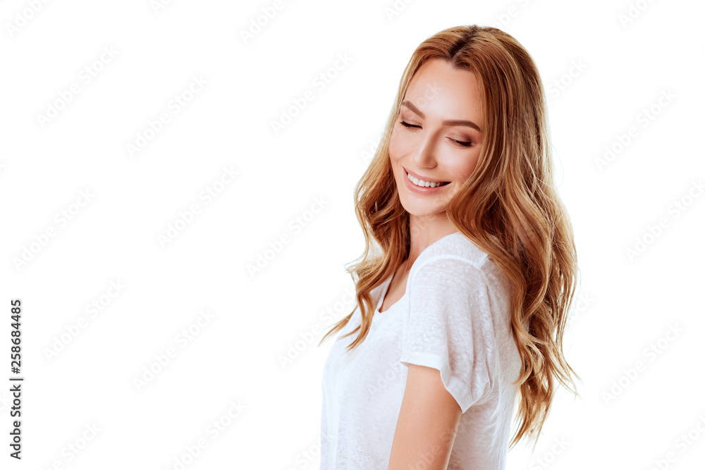 Portrait of a pretty smiling woman posing isolated on a white background Portrait of a pretty smiling woman posing isolated on a white background