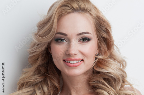 Blond woman with curly hair
