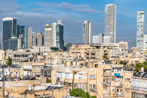 Tel Aviv's skyline high rise construction with water heaters, Israel. Old And New Buildings.