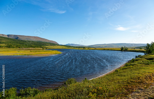 Summer day landscape with mountains and lake in the tundra  Yamal  Russia