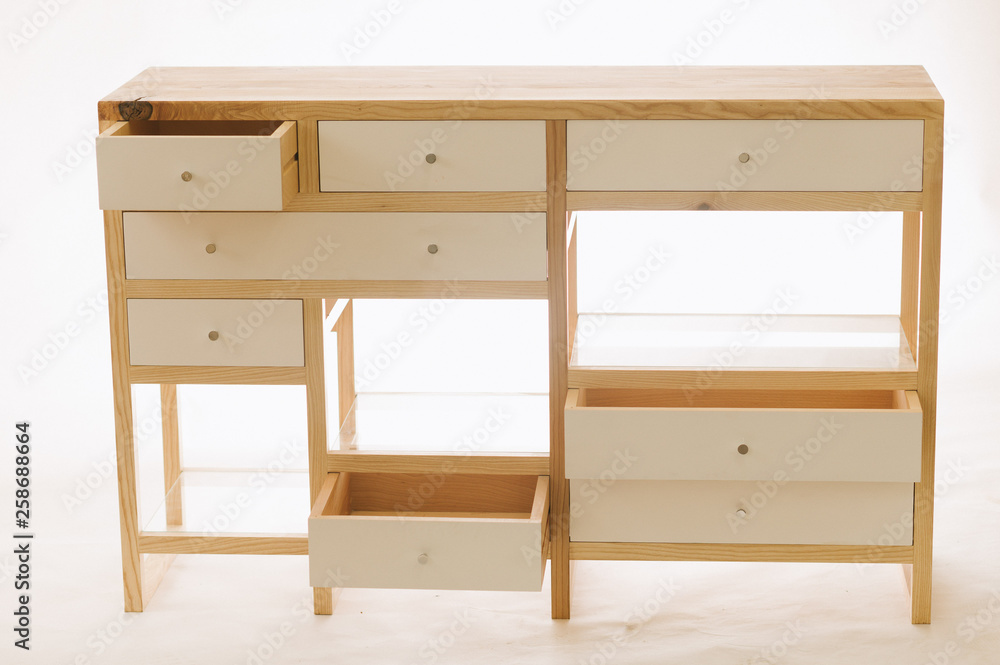 Handmade wooden table with drawers on white background Handmade wooden table with drawers on white background