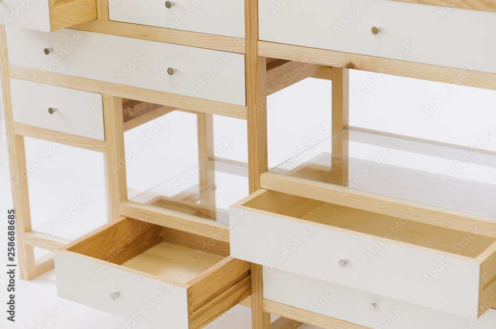 Handmade wooden table with drawers on white background Handmade wooden table with drawers on white background