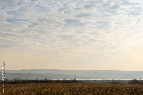 Rural scenery in Moldavia, along the national road E85. View towards Siret river