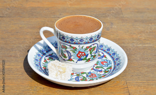 cup of Turkish coffee on wooden table