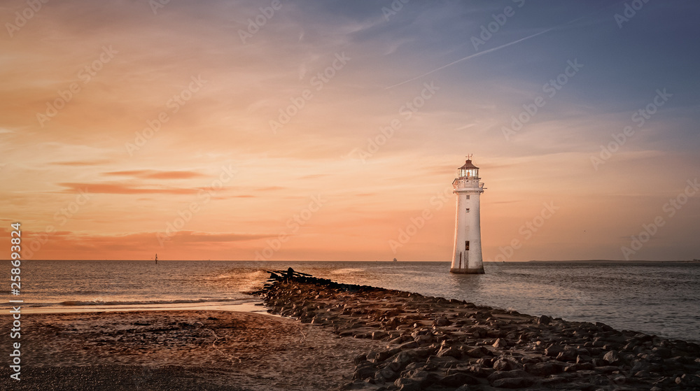 Fototapeta premium Perch rock lighthouse Liverpool sunset coastline