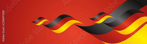 Germany Unity Day waving flags two fold red landscape background