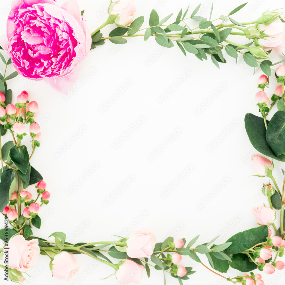 Fototapeta premium Floral frame with pink flowers, hypericum and eucalyptus on white background. Flat lay, top view