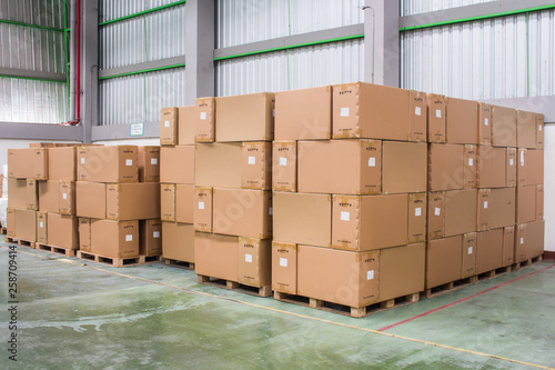 Rows of material boxes or product boxes in warehouse area.