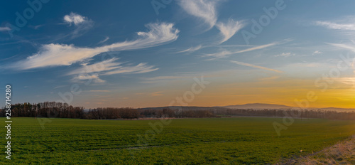 Color fields and blue sky in sunset time near Ceske Budejovice city