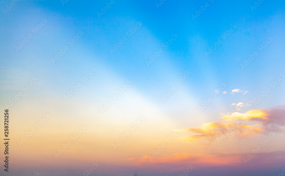 beautiful blue sunset sky with white clouds background, Nature background, yellow and orange tone.