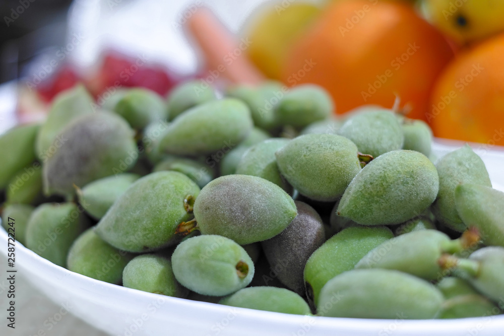 fresh fruit green almond ages in fruit plate fresh fruit green almond ages in fruit plate