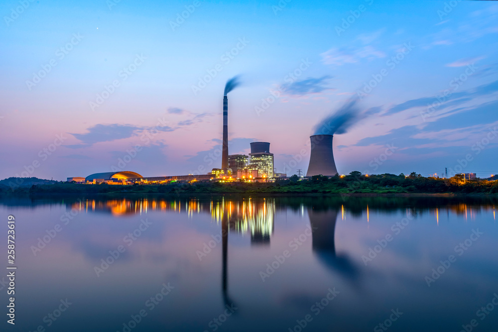 Naklejka premium At dusk, the thermal power plants , Cooling tower of nuclear power plant Dukovany