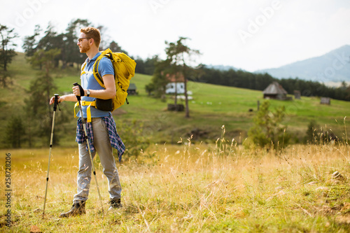 Active healthy man hiking at nature