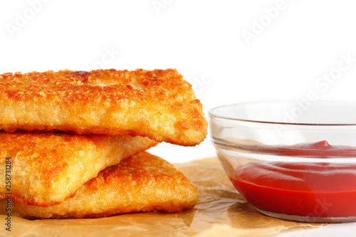 nuggets in with ketchup on a white background