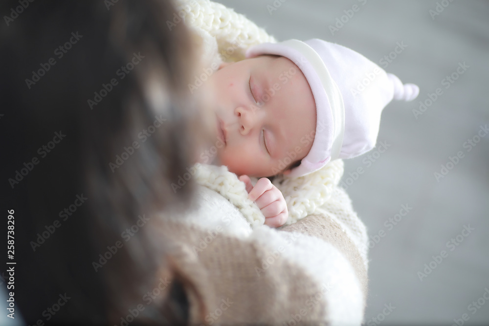 Baby newborn sleeping wrapped up in a blanket Baby newborn sleeping wrapped up in a blanket
