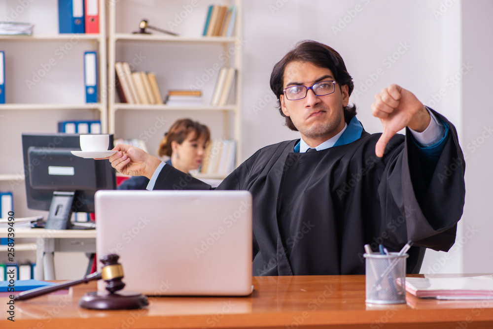 Two lawyers working in the office Two lawyers working in the office