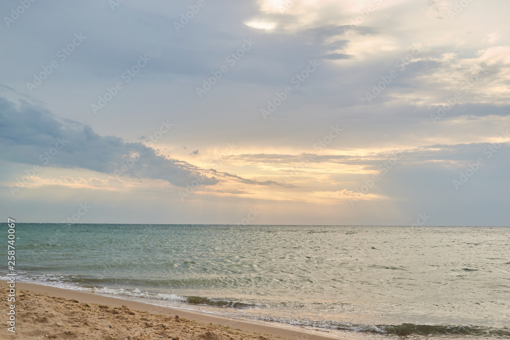 sunset and beach sunset shoot. Dramatic sky with clouds