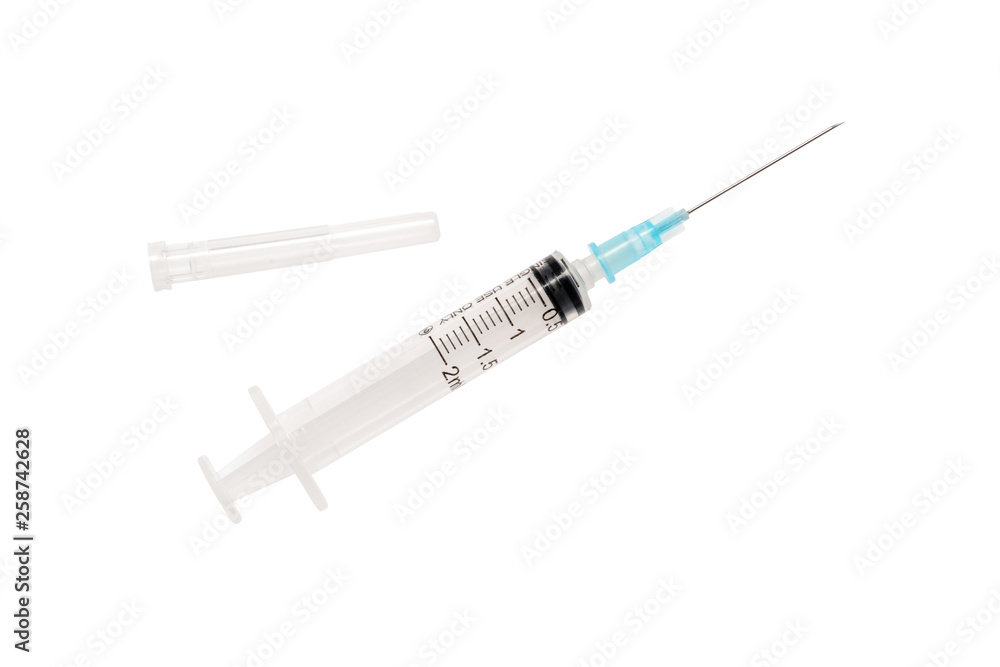 Syringe with plastic shell for needle. 2 ml syringe close up, isolate on white background Syringe with plastic shell for needle. 2 ml syringe close up, isolate on white background