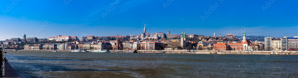 Panorama of the Buda bank of the Danube of the Budapest city in a beautiful early spring day