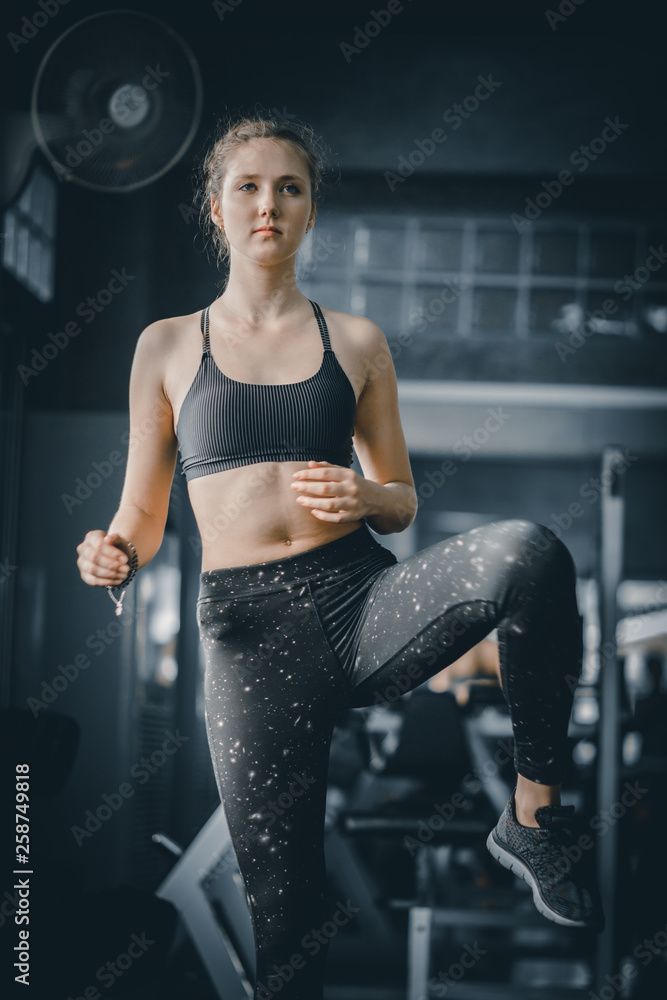 Portrait young attractive healthy woman body curve fitness doing exercises workout with ball in gym. People beauty perfect body slim fitness girl. Freedom happy and relax lifestyle healthcare concept. Portrait young attractive healthy woman body curve fitness doing exercises workout with ball in gym. People beauty perfect body slim fitness girl. Freedom happy and relax lifestyle healthcare concept.