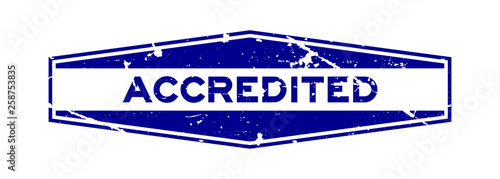 Grunge blue accredited word hexagon rubber seal business stamp on white background