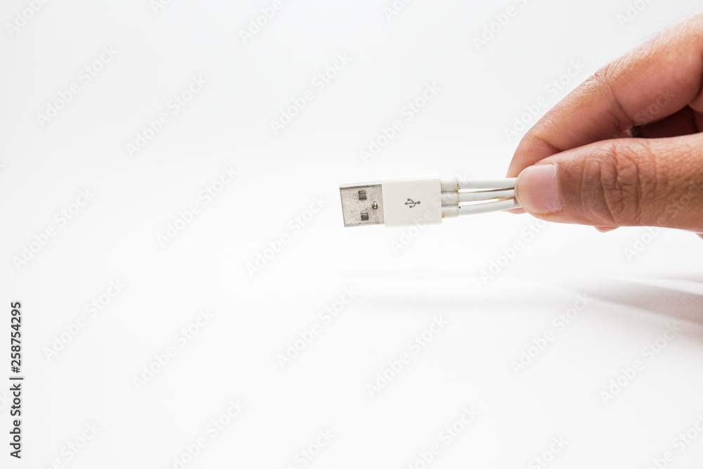 Old three way usb phone charging cable isolated on white Old three way usb phone charging cable isolated on white