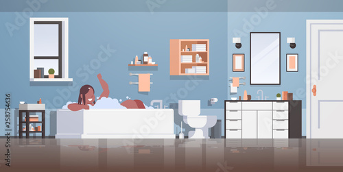 fat obese woman relaxing in bath with foam happy overweight african american girl bathing lying bathtub jacuzzi obesity concept modern bathroom interior horizontal