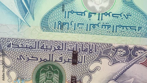 UAE dirham notes rotating. United Arab Emirates currency, money. 4K stock video footage photo