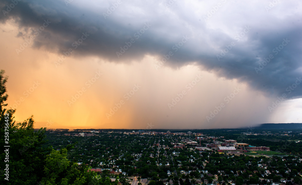 Rain storm moving over a town