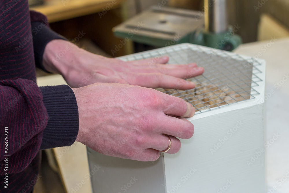 Obraz premium Making an insect hotel