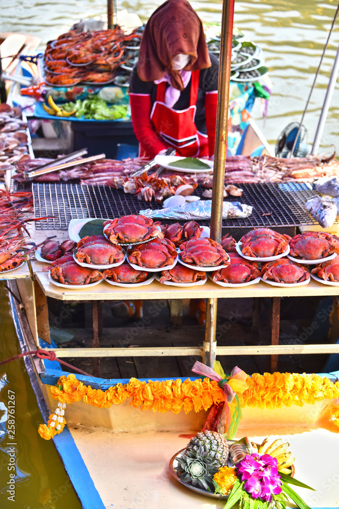 Preparing seafood on the boat in Thailand.