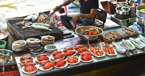 Preparing seafood on the boat in Thailand.