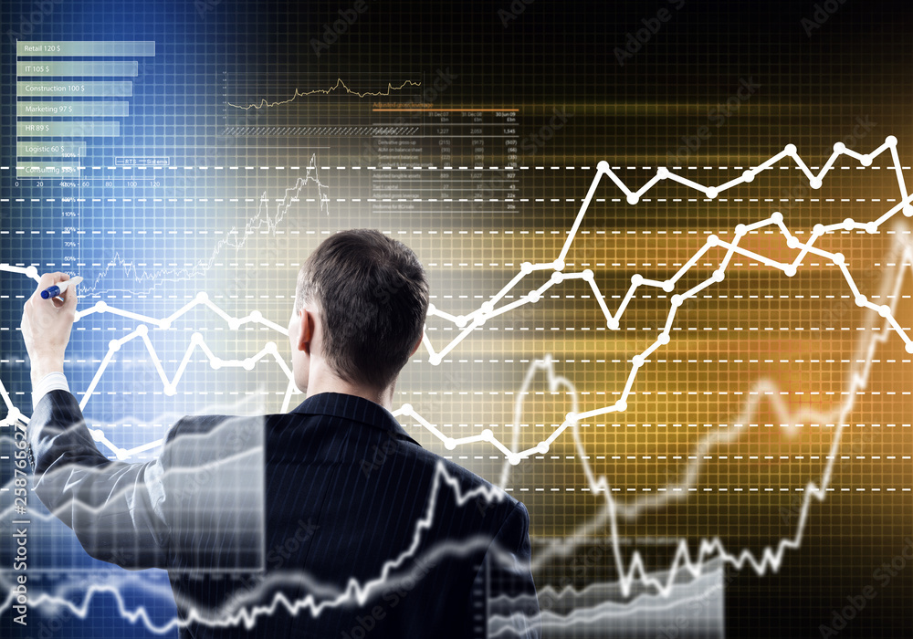 Businessman draw graphs Businessman draw graphs