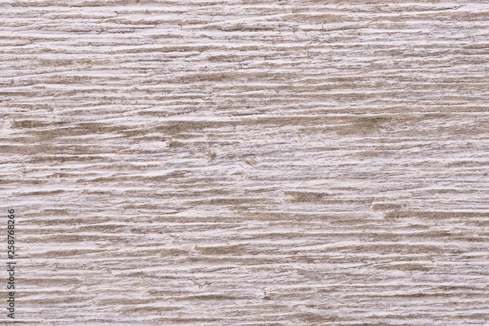 Naklejka premium Close up on a white painted wooden plank as abstract background. Copy space for your text.