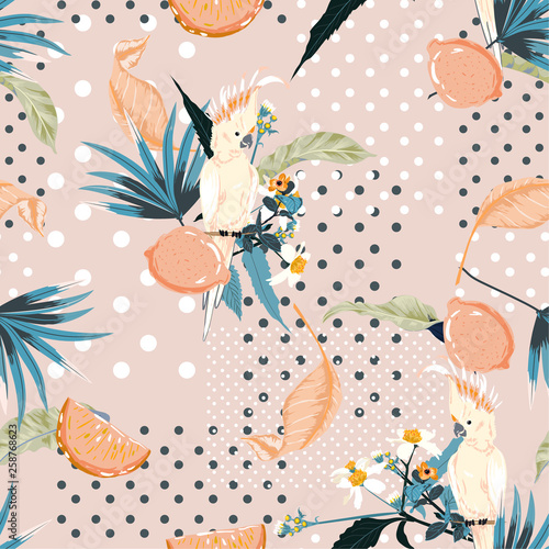 Trendy pastel Summer exotic tropical and lemon fruits with macaw bird on polka dots seamless pattern design for fashion ,fabric,web, wallpaper and all prints
