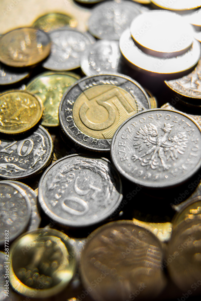 Stack of polish zloty coins. Coins stacked in different positions. Closeup, macro shot. Colors mat. Perfect fot background Stack of polish zloty coins. Coins stacked in different positions. Closeup, macro shot. Colors mat. Perfect fot background