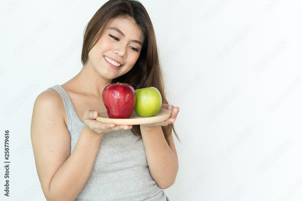 Healthy organic food for dieting woman concept. Woman carry green apple isolated on white background. Healthy organic food for dieting woman concept. Woman carry green apple isolated on white background.